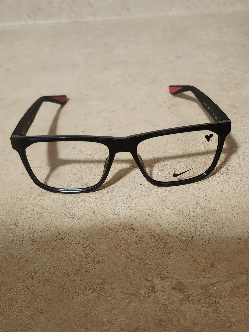 Nike Black Eyeglass Frames with Red Temple Tips